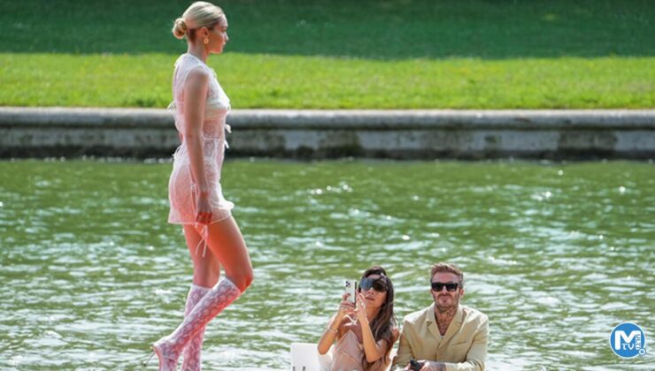 Karısı kızmasın diye telefonunu elinden bıraktı, ünlü modeli görmemek için başını öne eğmeye çalıştı